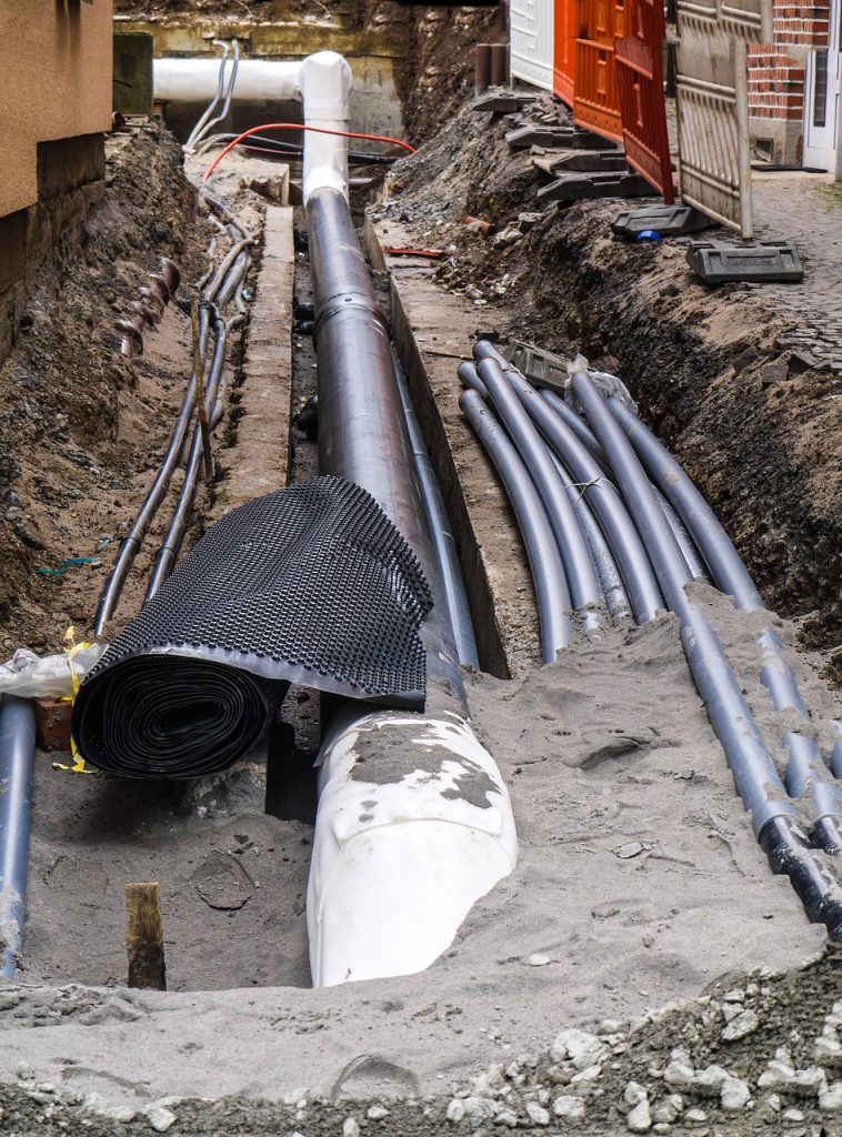 construction site, tube, earthworks, excavation, underground cables, to build, construction work, dirty, work, embarrassed, parallel, protection, insulation, nature, barrier, water pipe, channel, road construction, sand, underground, city, supply, warmth, water, electricity, piping, pipelines, wastewater